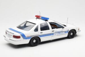 Chevrolet Caprice Sebring Politsei UT Models 1:18 21029 Metall - pilt 2/6