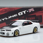 Nissan Skyline GT-R R34 Nismo Z-Tune Valge MotorHelix 1:18 - image 11 of 11
