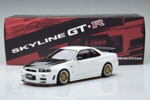 Nissan Skyline GT-R R34 Nismo Z-Tune Valge MotorHelix 1:18 M83407 Metall - pilt 11/11