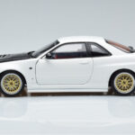 Nissan Skyline GT-R R34 Nismo Z-Tune Valge MotorHelix 1:18 - image 5 of 11