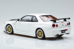 Nissan Skyline GT-R R34 Nismo Z-Tune Valge MotorHelix 1:18 M83407 Metall - pilt 7/11