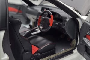 Nissan Skyline GT-R R34 Nismo Z-Tune Valge MotorHelix 1:18 M83407 Metall - pilt 8/11