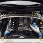 Nissan Skyline GT-R R34 Nismo Z-Tune Valge MotorHelix 1:18 - image 9 of 11