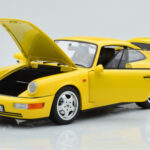 Porsche 911 964 Carrera 2 Kollane Norev 1:18 - image 2 of 8