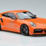 Porsche 911 992 Turbo S China 20th Anniversary Oranž Minichamps 1:18 - image 4 of 6