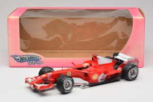 Ferrari 248 F1 #5 M. Schumacher German GP Hockenheimring 2006 Hot Wheels 1:18 J2887 Metall - pilt 6/6