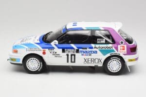 Mazda 323 GTX #10 T. Makinen / S. Harjanne 1000 Lakes Rally 1991 Otto 1:18 OT1099 Vaik - pilt 3/6