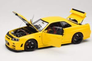 Nissan Skyline GT-R R34 Customized Version Kollane MotorHelix 1:18 M83412 Metall - pilt 2/8