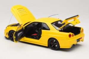 Nissan Skyline GT-R R34 Customized Version Kollane MotorHelix 1:18 M83412 Metall - pilt 5/8