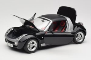 Smart Roadster Must Bburago 1:18 34099-M1 Metall - pilt 2/8