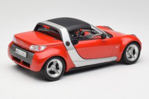 Smart Roadster Punane Bburago 1:18 34099 Metall - pilt 3/8