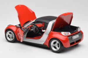 Smart Roadster Punane Bburago 1:18 34099 Metall - pilt 5/8