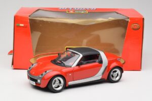 Smart Roadster Punane Bburago 1:18 34099 Metall - pilt 8/8