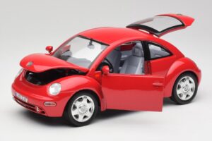 Volkswagen New Beetle Punane Bburago 1:18 3342 Metall - pilt 2/8