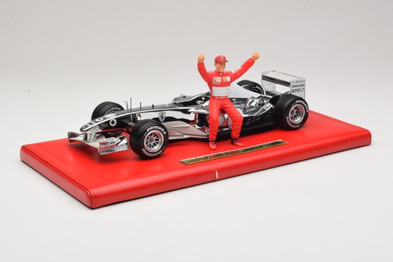 Ferrari F2004 #1 M. Schumacher Six Time World Champion 2004 Kroom Hõbe Hot Wheels 1:18 Ferrari F2004 #1 M. Schumacher Six Time World Champion 2004 Kroom Hõbe Hot Wheels 1:18 C7332 Metall