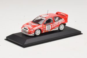 Ford Escort Cosworth Toshiba #11 A. Vatanen / Freeman 1994 Minichamps 1:43 430981811 Metall - pilt 2/4